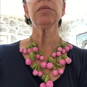 Handmade beaded necklace in pink/green. Made USA.